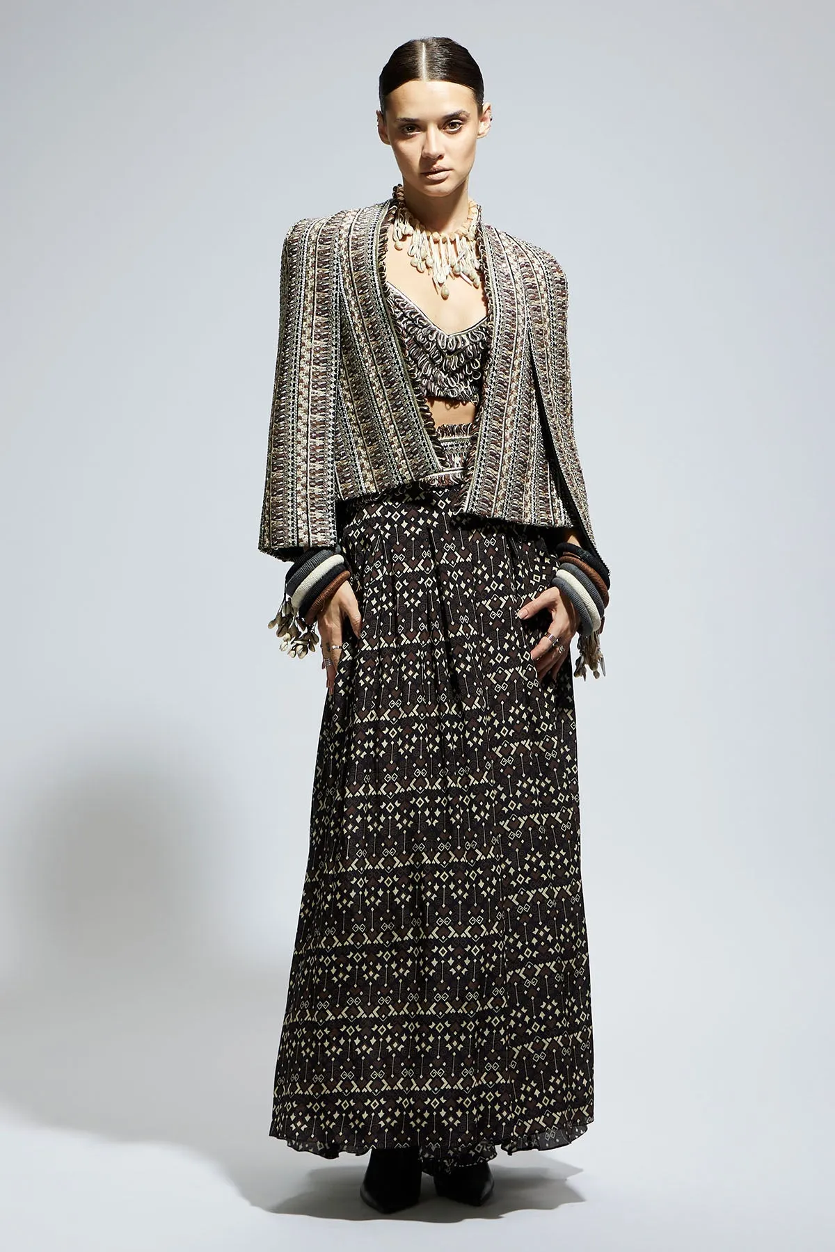 Brown Threadwork Cape Jacket Paired with Textured Bustier and Flared Pants