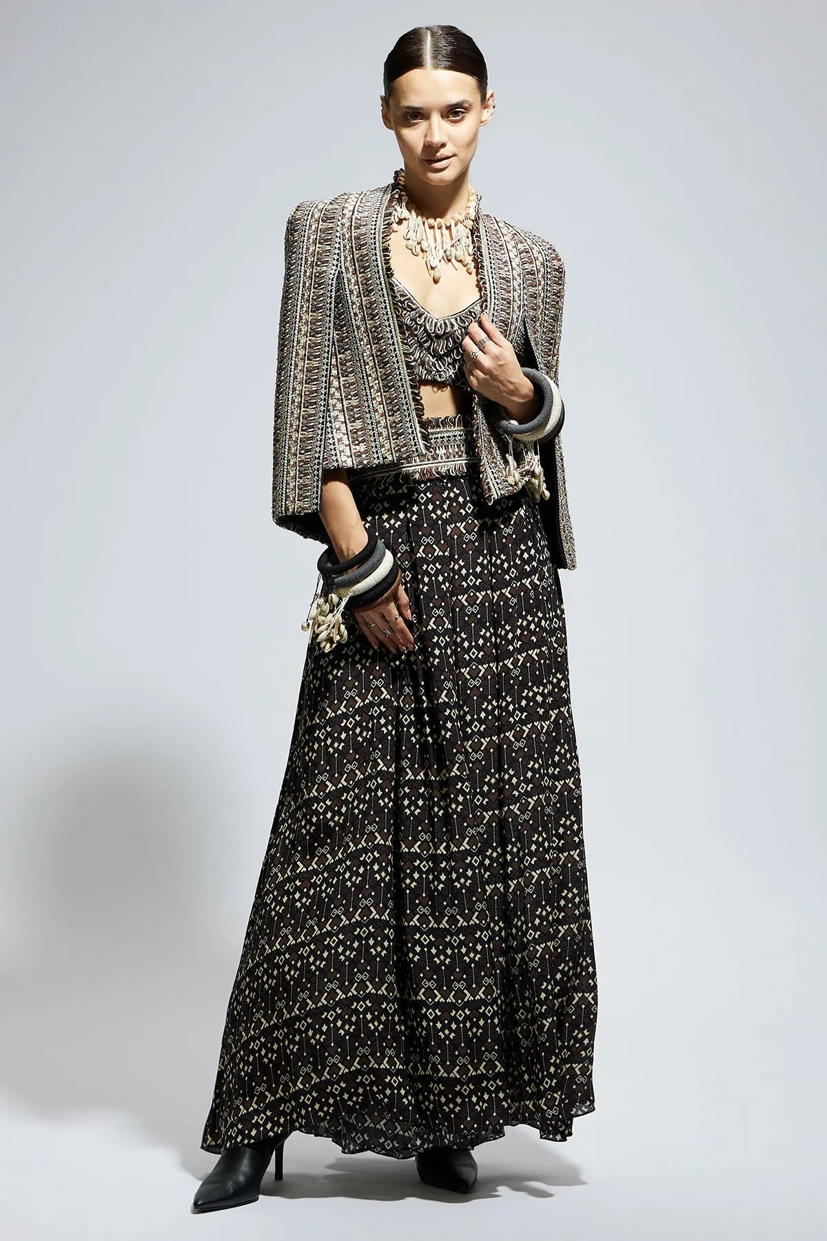 Brown Threadwork Cape Jacket Paired with Textured Bustier and Flared Pants