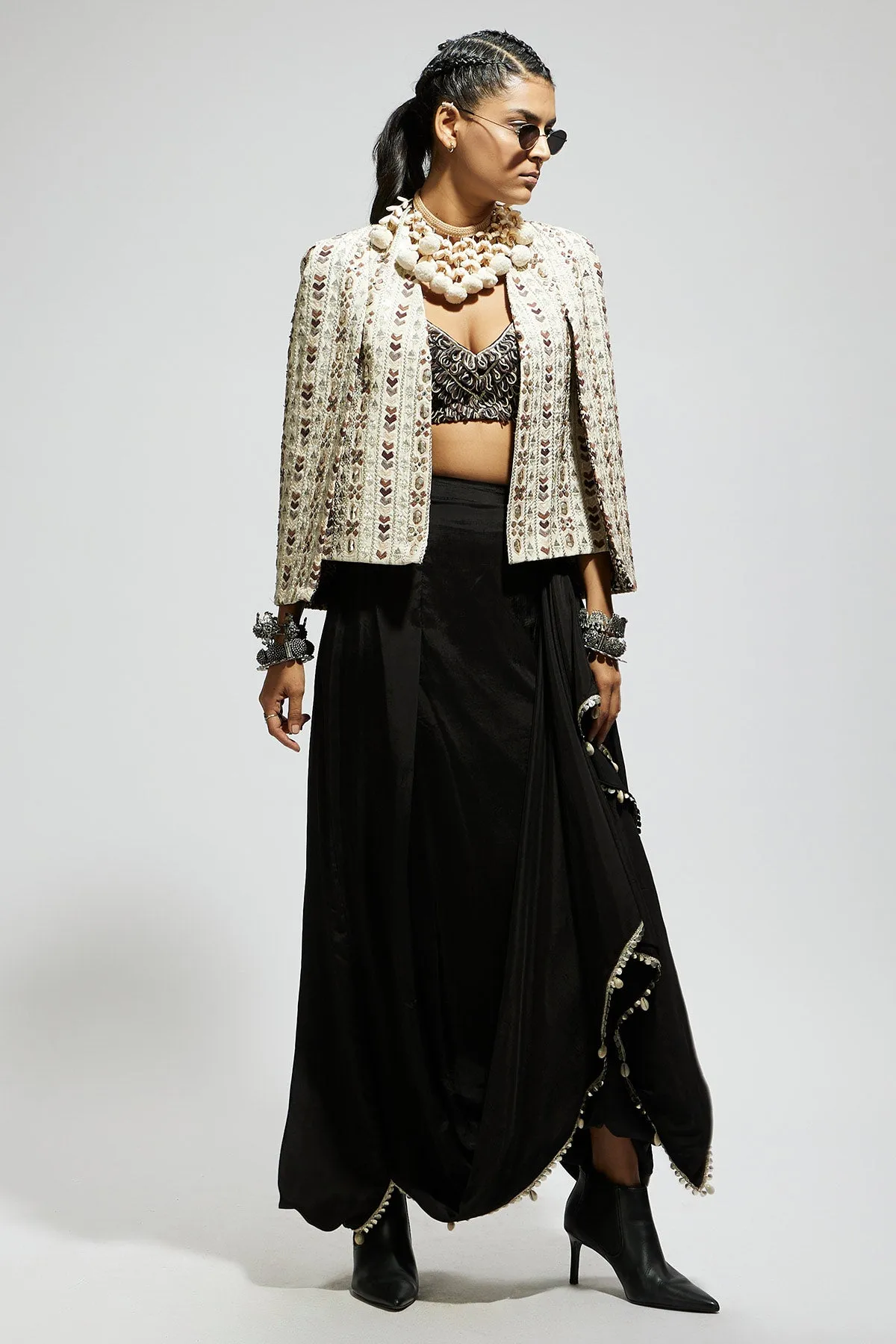Ivory Embellished Cape Jacket Paired with Textured Bustier and Drape Skirt