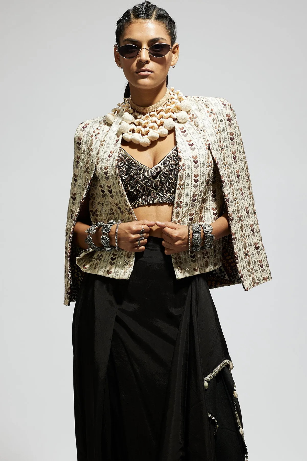 Ivory Embellished Cape Jacket Paired with Textured Bustier and Drape Skirt