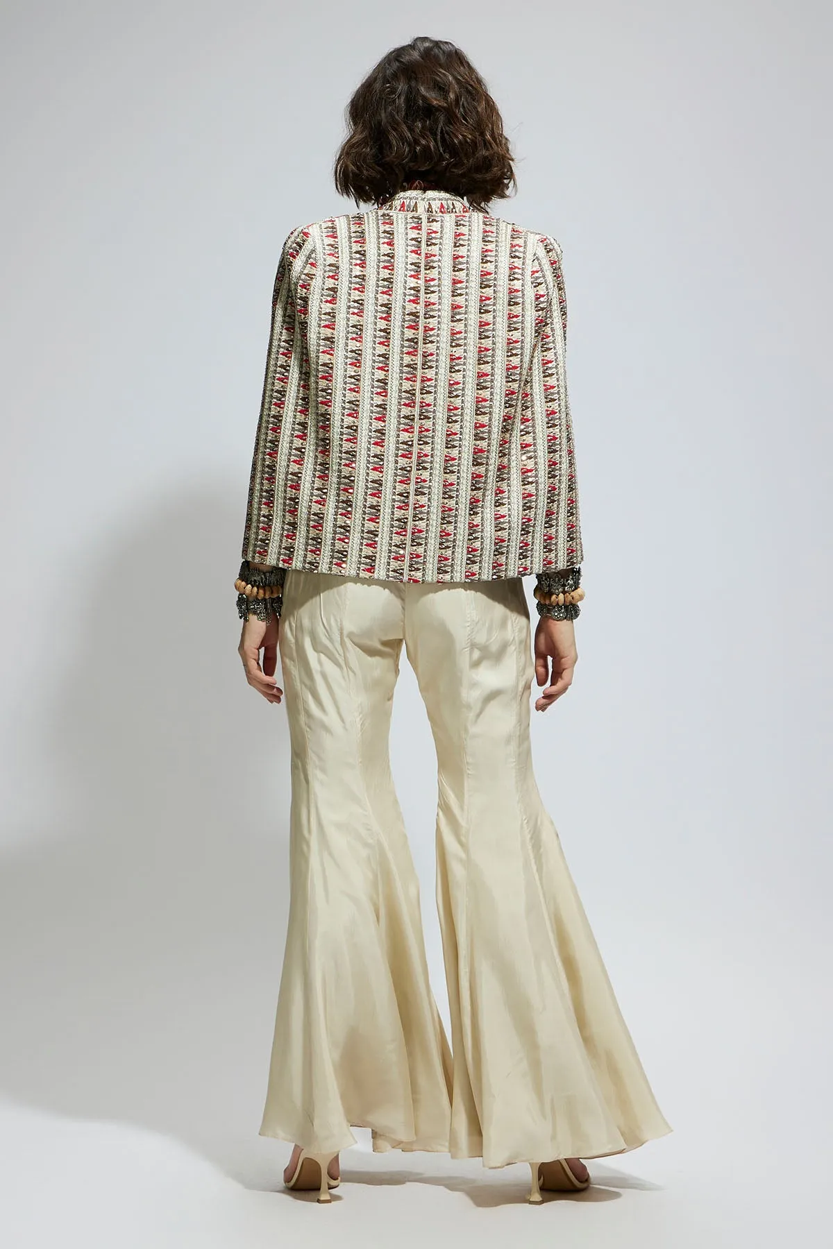 Ivory Embellished Cape Jacket Paired with Textured Bustier and Sharara Pants