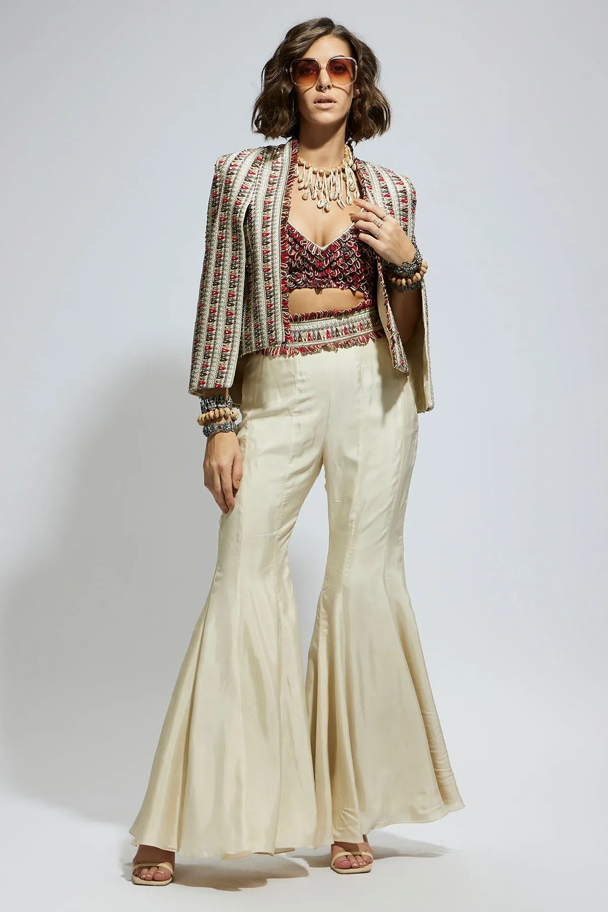Ivory Embellished Cape Jacket Paired with Textured Bustier and Sharara Pants