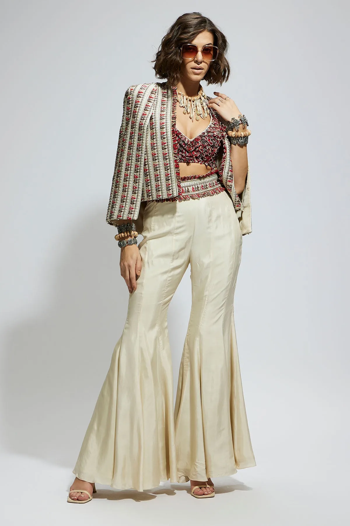 Ivory Embellished Cape Jacket Paired with Textured Bustier and Sharara Pants