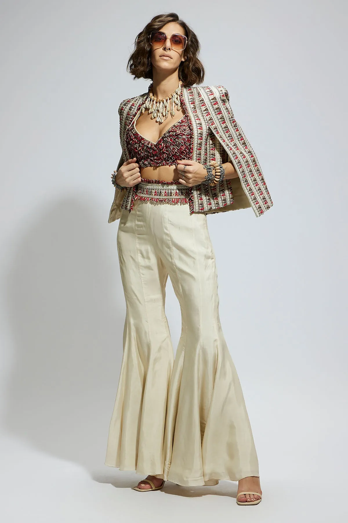 Ivory Embellished Cape Jacket Paired with Textured Bustier and Sharara Pants