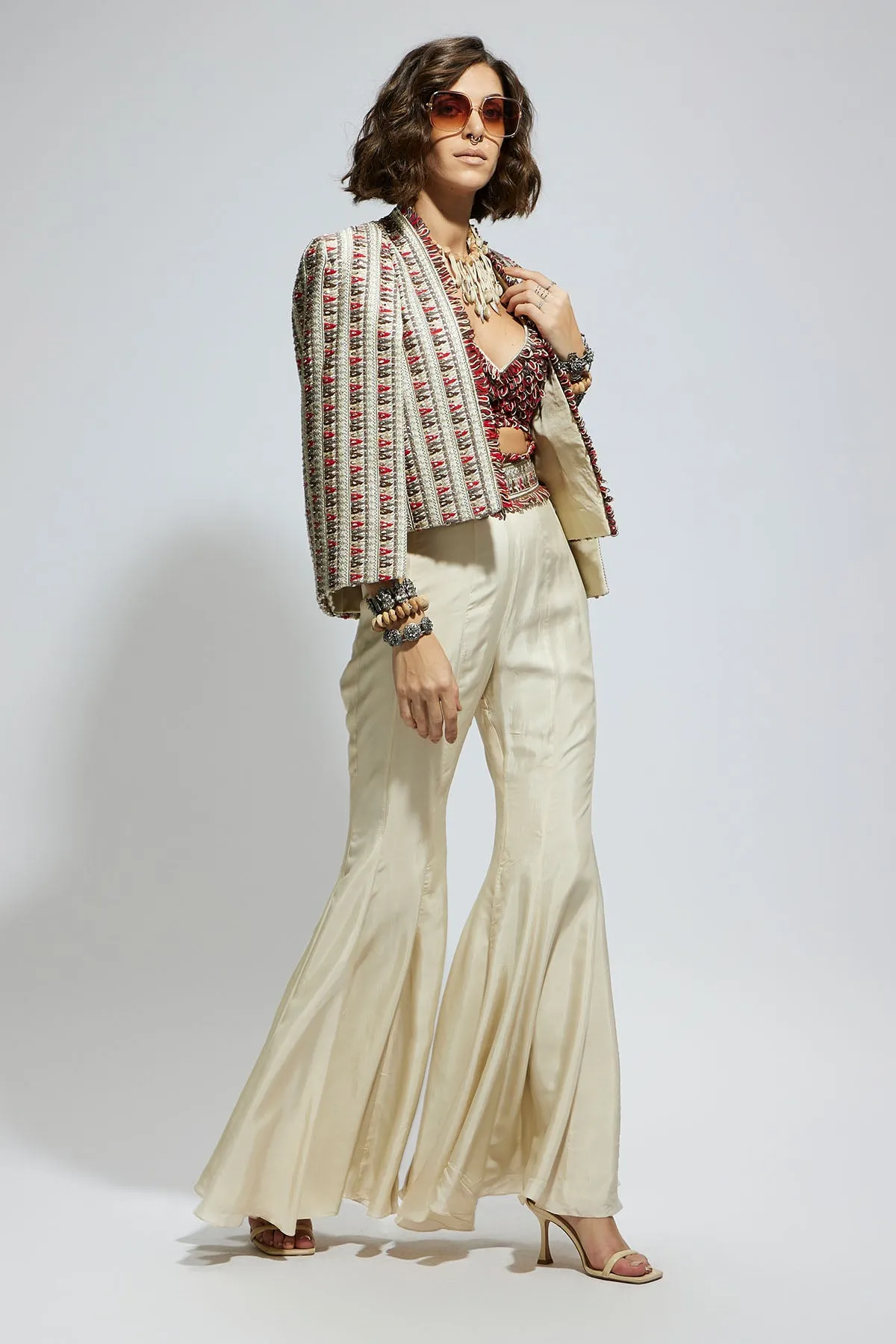 Ivory Embellished Cape Jacket Paired with Textured Bustier and Sharara Pants